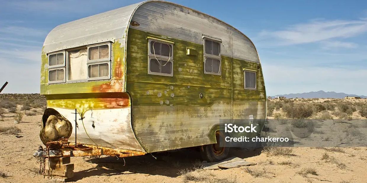 AN ABANDONED TRAILER THAT A SHORT STORY IS WRITTEN ABOUT A MAN WHO TURNS INTO A ROACH