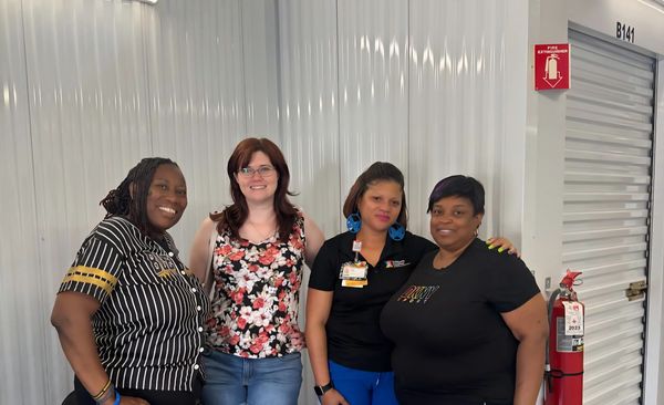 Group of staff and client represenative.