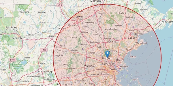 Map showing a central point near Medford, Massachusetts with a large radius circle.