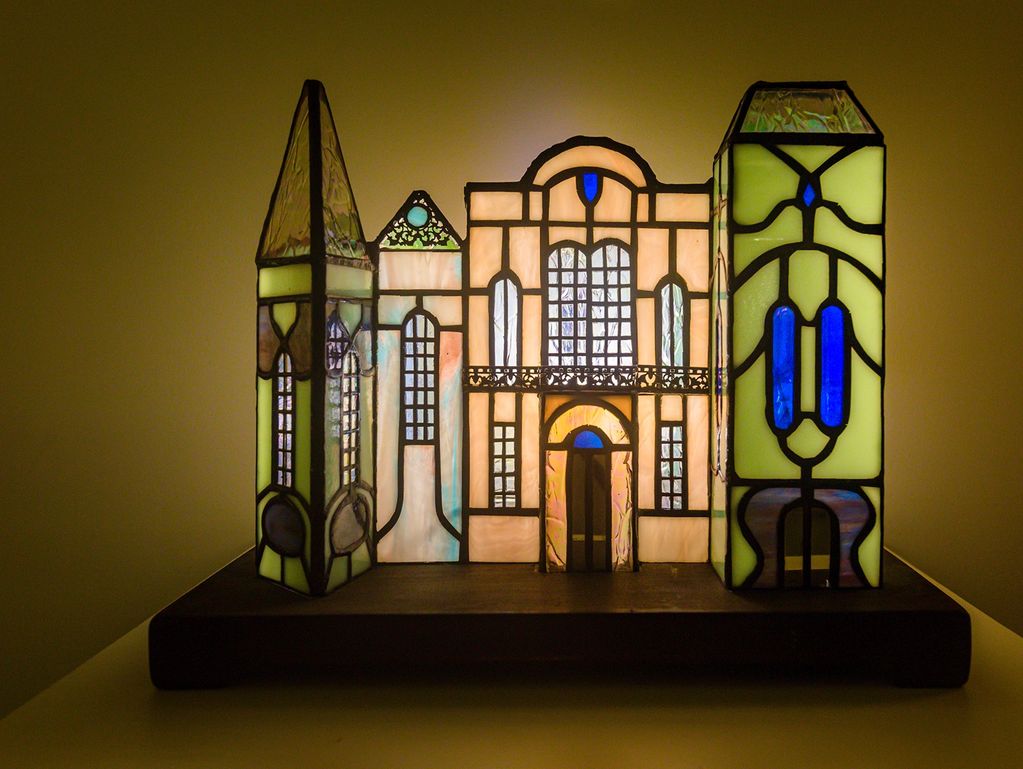 Stained glass houses  handcrafted art pieces, bringing  lighting and  atmosphere, decor to any home.