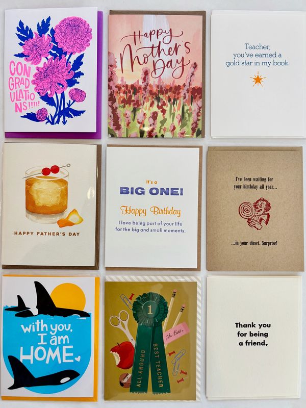 A collection of nine assorted greeting cards for various occasions.