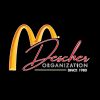 Peacher Organization logo with a stylized 'M'.