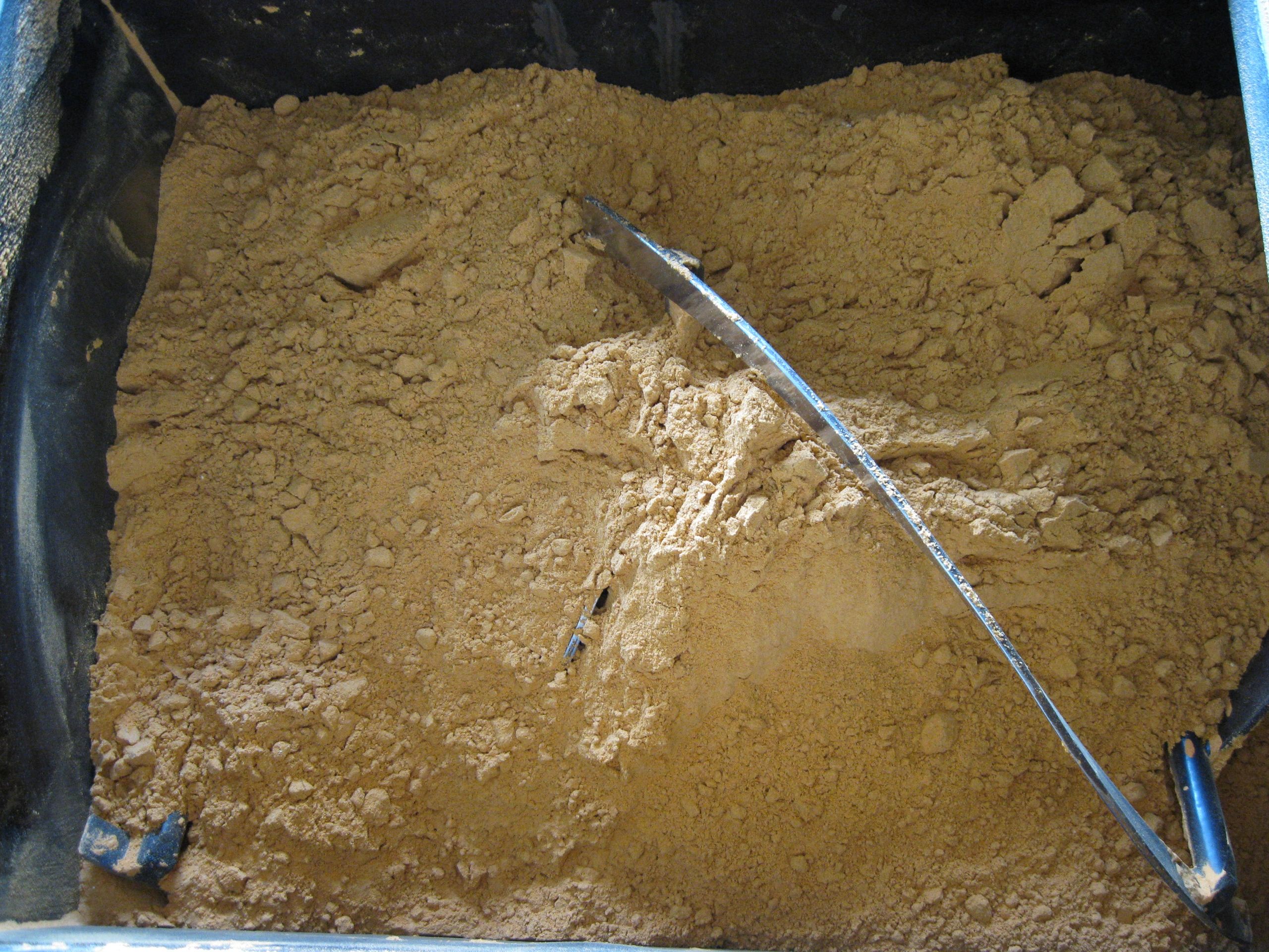 Bulk spice and seasoning blend in a commercial ribbon blender at SisCo