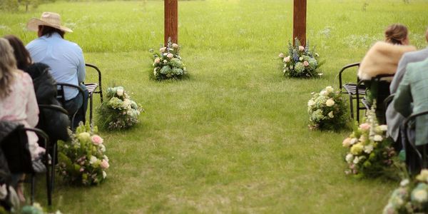 Wedding ceremony flowers, at White Raven, Alberton, Montana