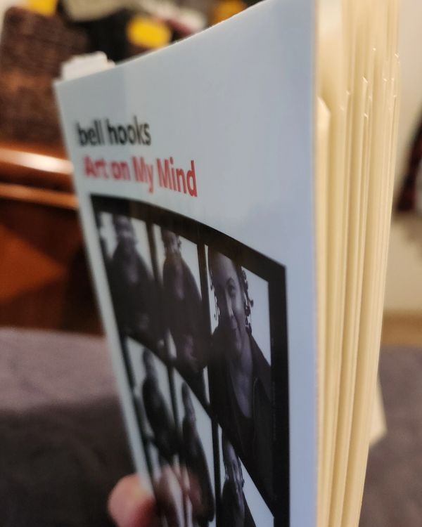Close-up of the book 'Art on My Mind' by bell hooks.