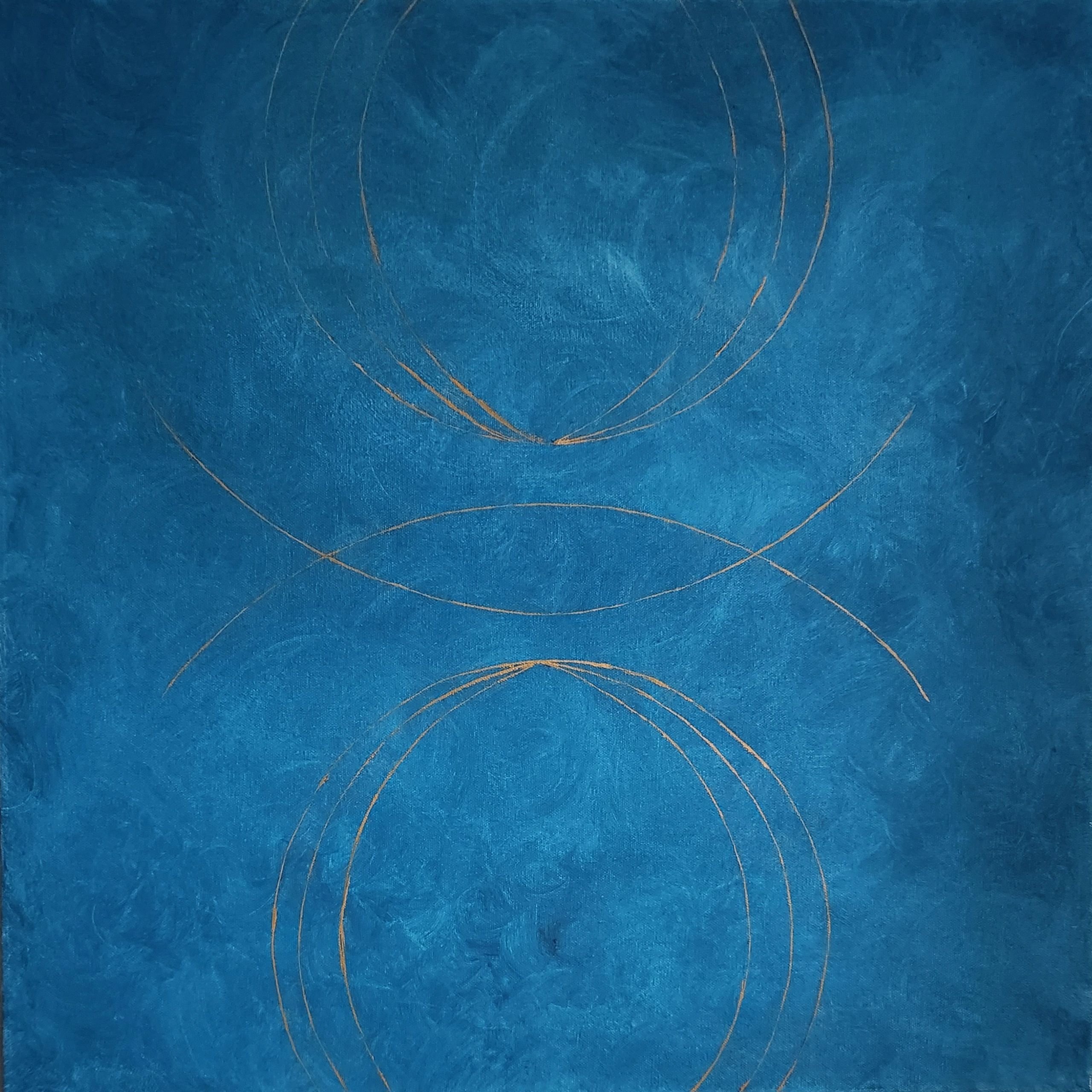 Blue textured surface with faint circular line patterns.