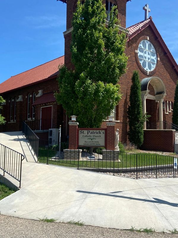 Image of the outside of St. Patrick's Catholic Church looking at the side. 