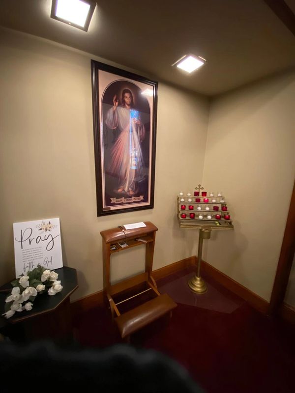 Image inside St. Cecilia's Church - looking at the prayer station with votive candles. 
