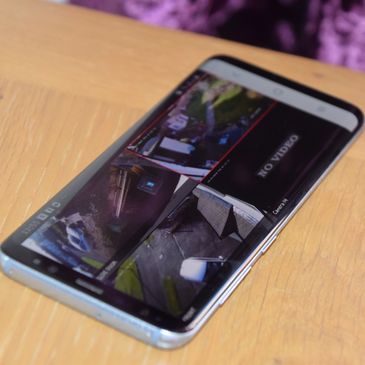 Smartphone showing a surveillance system interface.