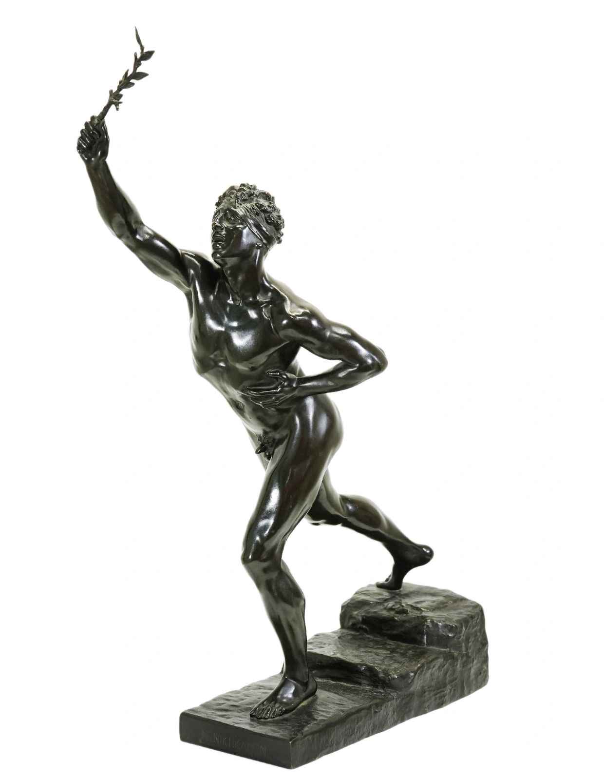 Bronze statue of a muscular male figure holding a branch, posed dynamically on steps.