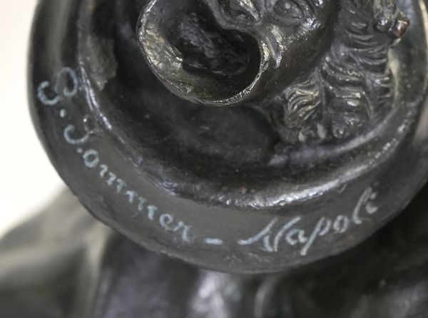 Close-up of the engraved foundry inscription on Maison Palm Beach's Neapolitan Fisherman bronze scul