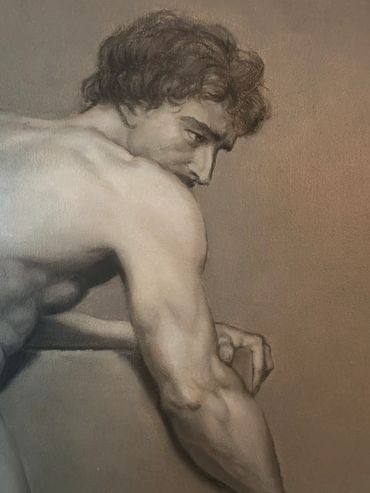 A detailed grayscale drawing of a muscular man with curly hair looking downward.