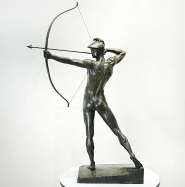 Bronze sculpture of a nude archer poised to shoot an arrow.