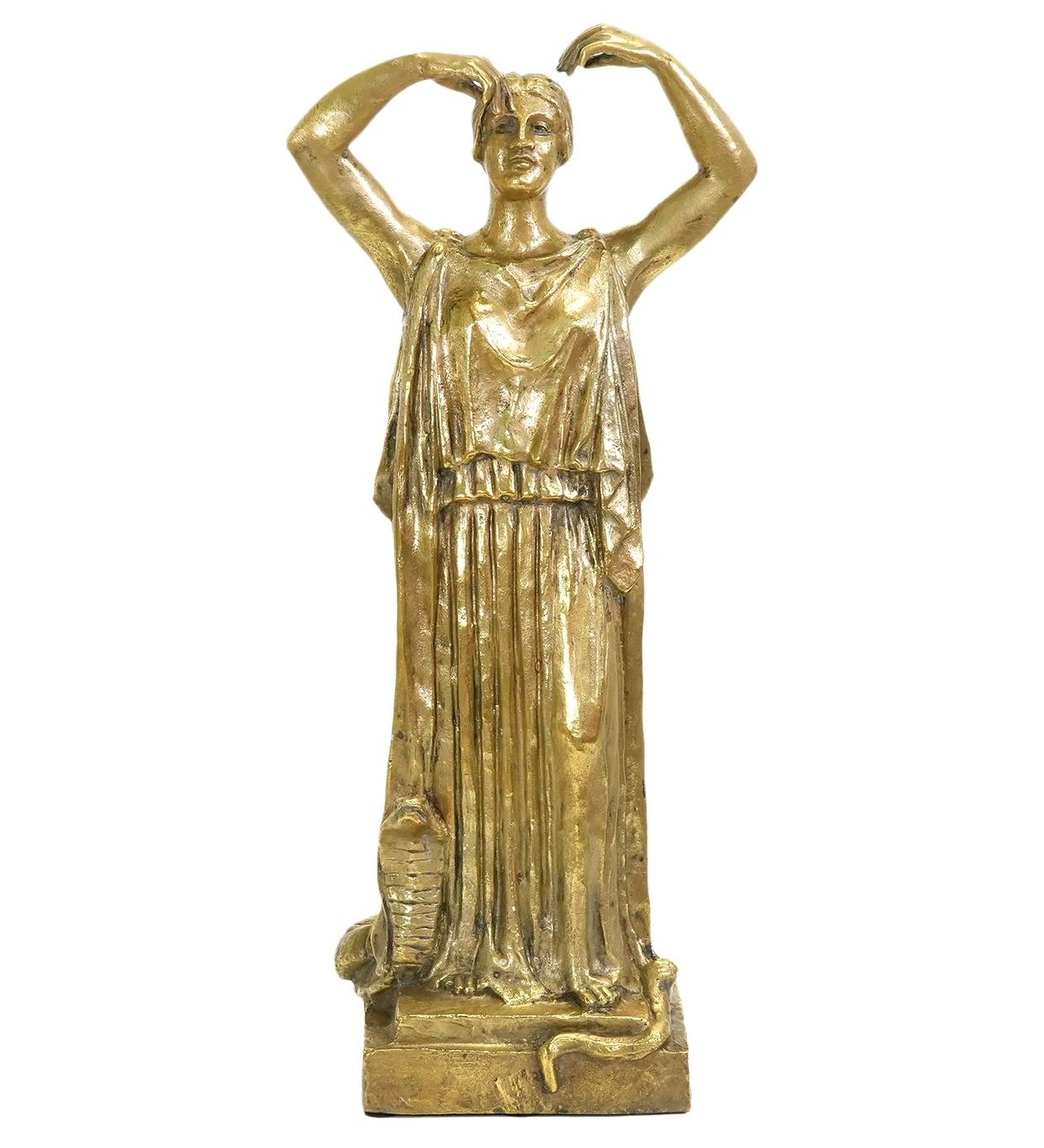 Golden statue of a woman with raised arms and draped clothing.