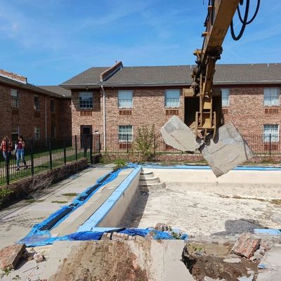 Demolishment of a hotel swimming pool.