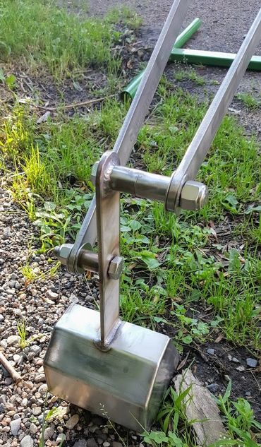 Stainless steel bucket for a sand digger.