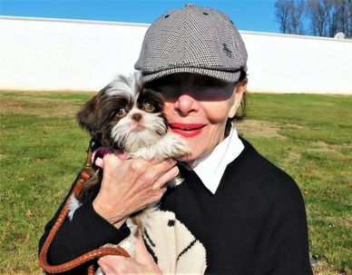 Linda Dano holding her Shih Tzu puppy from breeder Pup-Tzu WNC.