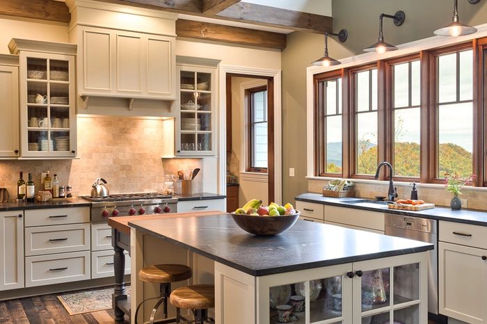 Modern white painted kitchen with island and custom cabinetry