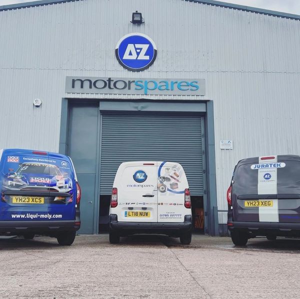 A-Z Motorspares entrance with 3 vans parked in front