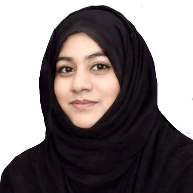 Portrait of a woman wearing a black hijab against a white background.