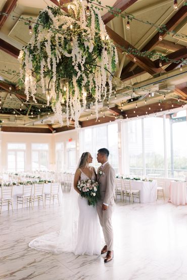 Edison Lights wrapped with ivy + Wisteria Chandelier