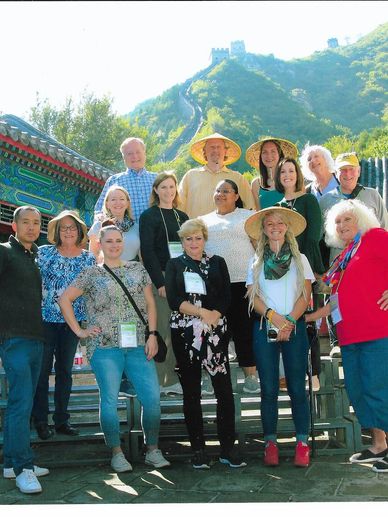 OUR GROUP POSING INFRON OF ONE GATE OF THE GREAT WALL