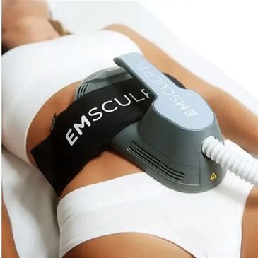 Person undergoing EMSculpt body contouring treatment on abdomen.