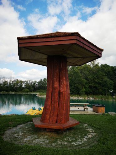 Restored Muskoka wooden mushroom feature with professional media blasting and premium stain finish.