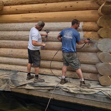 Log home restoration in Ontario. After media blasting, Sansin stain was applied to this boat house,