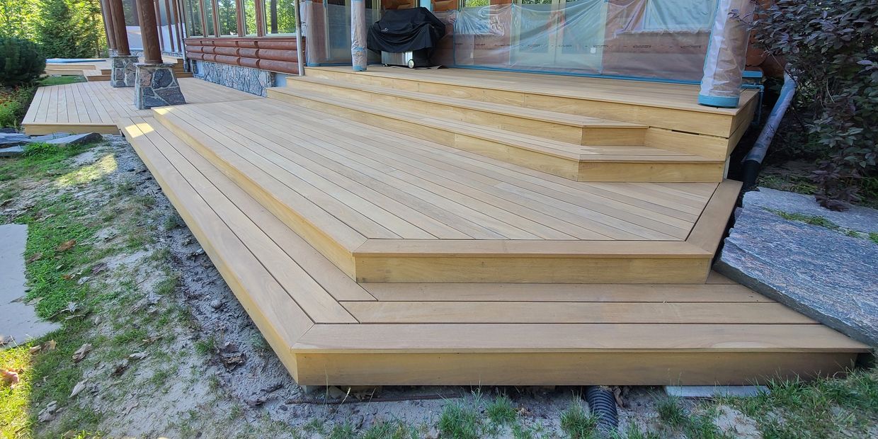 Log Home Restoration- IPE decking media blasted, wood restoration services