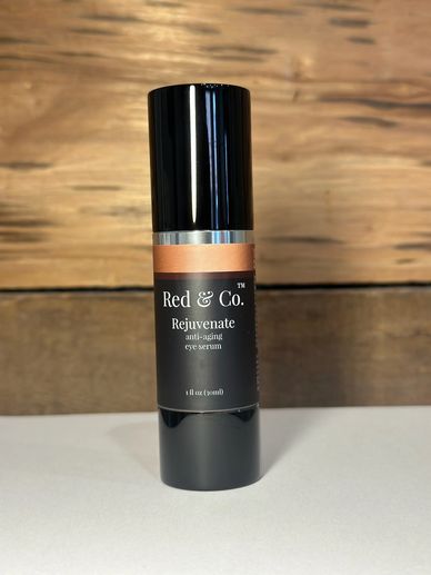 Red &amp; Co. Rejuvenate anti-aging eye serum in a sleek black bottle.