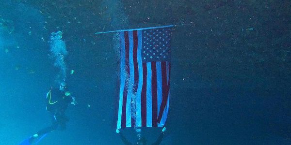 scuba diving class with a American flag 