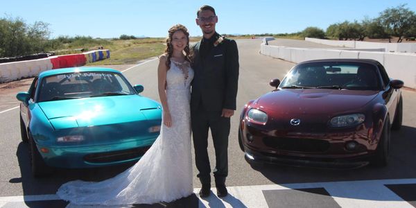 Wife/husband duo wedding day at Inde Motorsports Ranch.