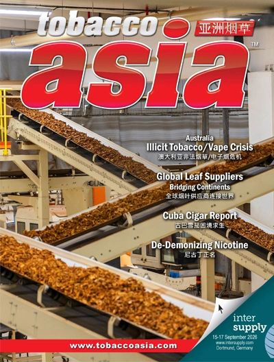 Cover of Tobacco Asia magazine featuring tobacco processing machinery.