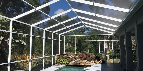 Modern Pool Cage Painting painted this pool enclosure in white color in Naples, Florida.