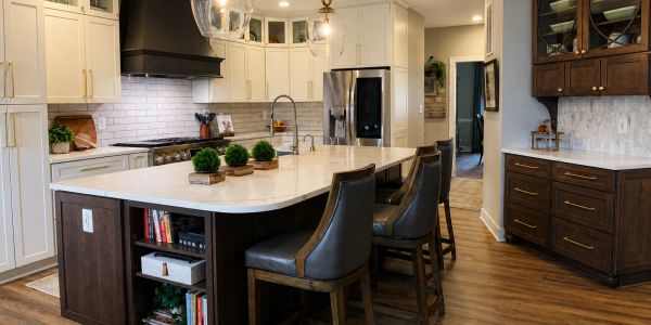 Modern kitchen with white and dark wood cabinetry.