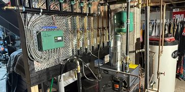 Complete oil boiler changeout. I built the wall to make everything completely serviceable, and add a