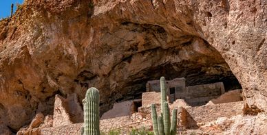 well-preserved ancient cliff dwellings against the backdrop of the majestic Tonto National Forest.