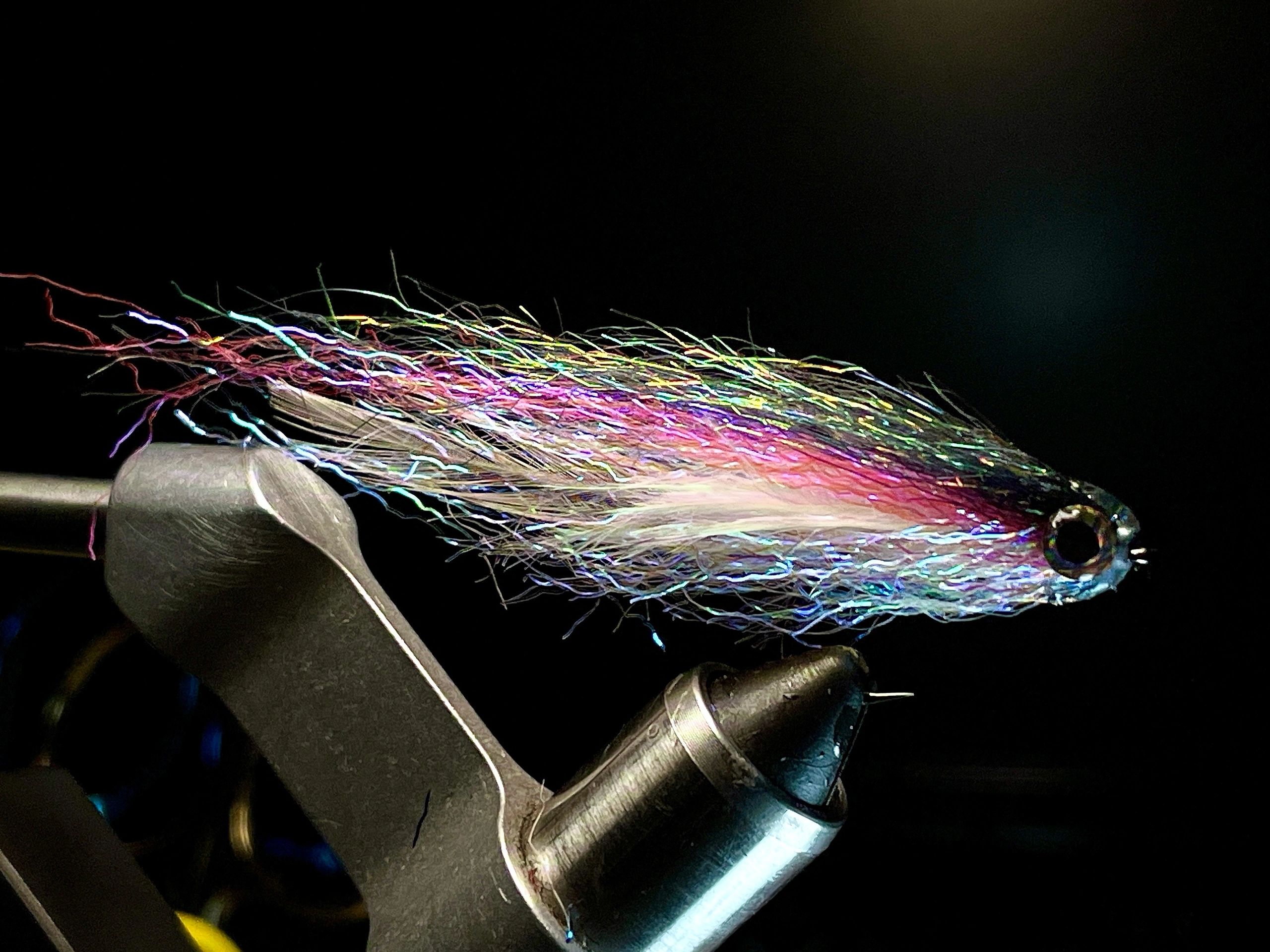 Rainbow trout colored baitfish fly made out of ripple ice fiber