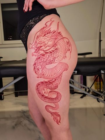 Dragon fine line tattoo hips black an red ink hand drawn design delicate  Asian style tattooed girl