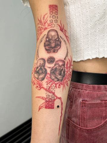 Buddha fine line tattoo arm black red ink hand drawn design Sakura sacred Asian style tattooed girl