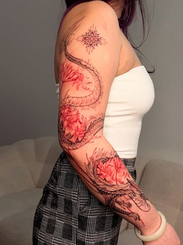 dragon tattoo ink red lilies flower art floral delicate tattoo Asian sleeve project design unique
