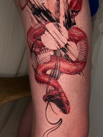 Snake tattoo brushstroke tattoo abstract art thigh strong red and black graphic 

