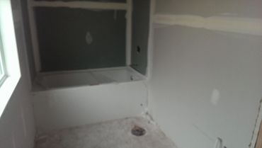 New bathtub installed during a renovation. (Rough plumbing stage)