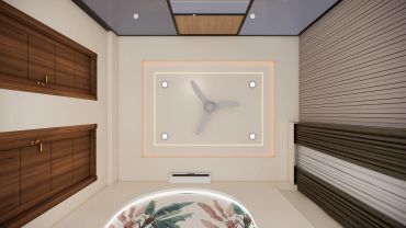 Ceiling fan and lights on a decorated ceiling.