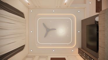 Modern ceiling with a fan and recessed lighting.