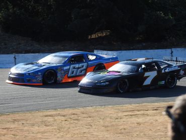 Robin Fawcett and another racer battling for a position super late model race south sound speedway 