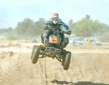 ATV racing AMA District 37 Gran Prix champion. Honda trx450r. ATV jumping 