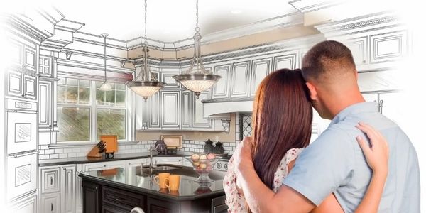Couple envisioning a kitchen remodeling design with a mix of sketch and real elements.