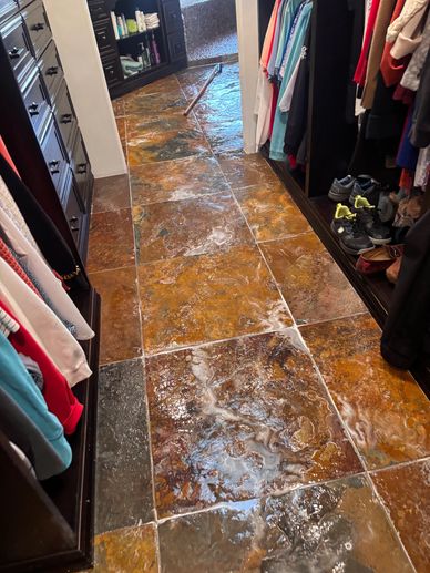 Natural stone floor cleaning, polishing, and honing in a home closet in Gilbert, AZ.